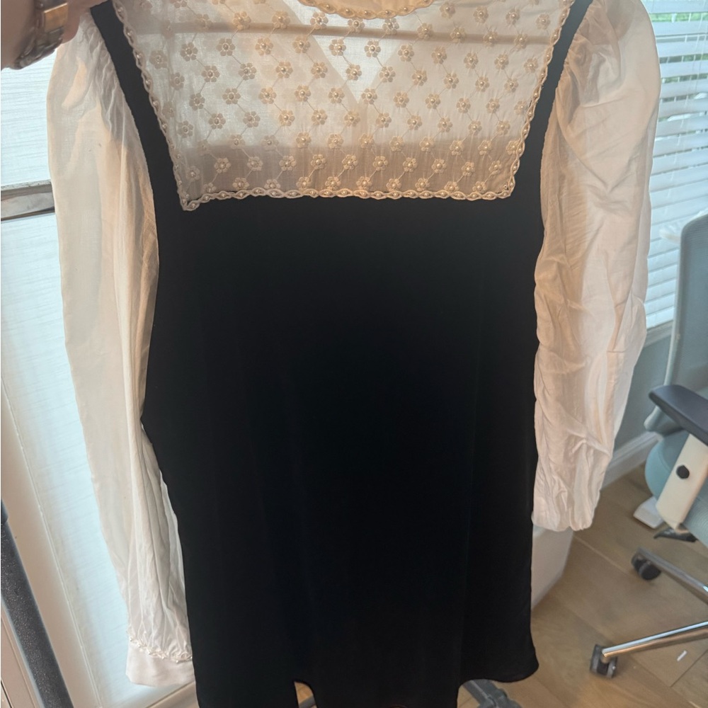 Chic Black Dress with White Lace Detail